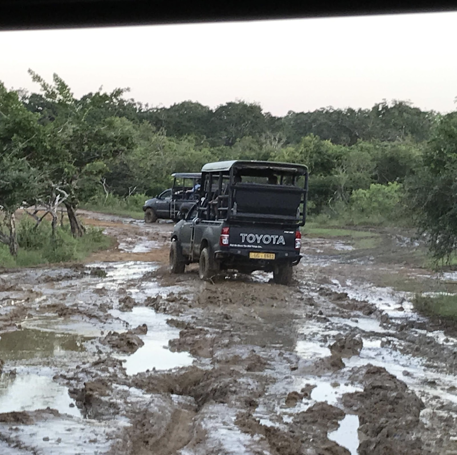 Image of toyota open roofed vehicle in muddy terrain